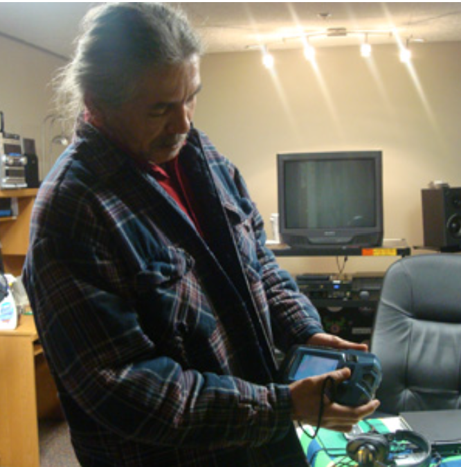 A man uses a spoken-word Potawatomi translator