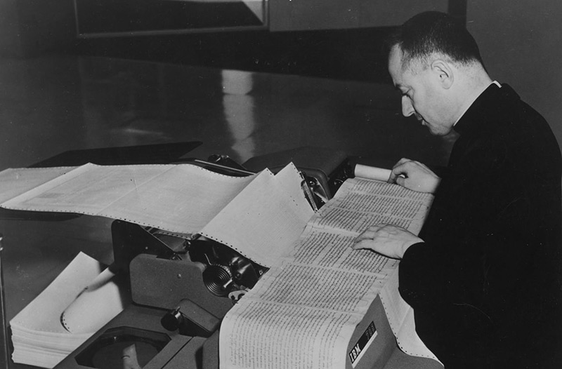 Roberto Busa using an IBM