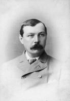 Black and white portrait of Sir Arthur Conan Doyle