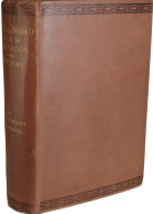 View of brown book cover with black stamped edges and gilt lettering on spine