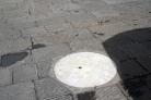 This circle marks the spot where the Palla del Verrocchio fell in 1601 after being struck by lightning.