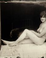 Bellocq, E. J. Storyville Photo, Woman seated in frame. 1912.