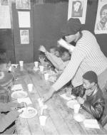 Member of the black panther party serving breakfast to kids