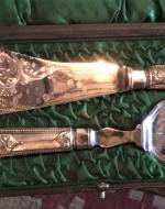 Decorated silver fish knife and fork in presentation box
