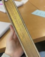 gold foiled pages of a book