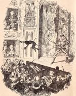 A boy painted as a monkey being tossed into the crowd by his father