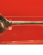 Moustache spoon with inset of Victorian man with a large moustache and beard