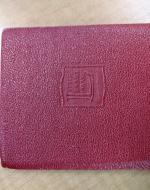 Back cover of the book, with embossed logo of the Little Luxart Library.