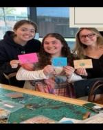 A picture of me finishing my regency letter in class. 