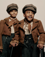 two young actors dressed as Tiny Tim