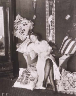 Bellocq, E. J. Storyville Photo, Seated Woman with pillows. 1912.