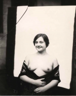 Bellocq, E. J. Storyville Photo, Smiling woman, shawl, posed. 1912