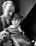 Author A. A. Milne with his son, Christopher Robin, and stuffed animal Winnie in 1926.