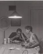 Weems, Carrie Mae. Untitled (Man Eating Lobster) from The Kitchen Table Series. 1990. 
