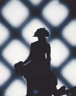 Weems, Carrie Mae. Untitled (Woman As Napoleon Riding Atop a Man). 2003. 