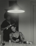 Weems, Carrie Mae. Untitled (Mother and Daughter combing) from The Kitchen Table Series. 1990.