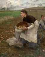 Woman Stoops to Push Potatoes into a Sack