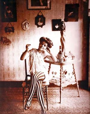 Bellocq, E. J. Photograph of Woman in Striped Leggings. 1915.