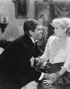 Hyde grabs Ivy while sitting together in bed