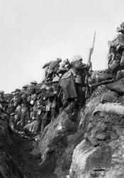 The pictures shows men in a trench