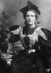 Natalie Clifford Barney with dog. Wikicommons. Public domain.