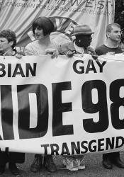 Celebrities help to hold a banner opposing Section 28