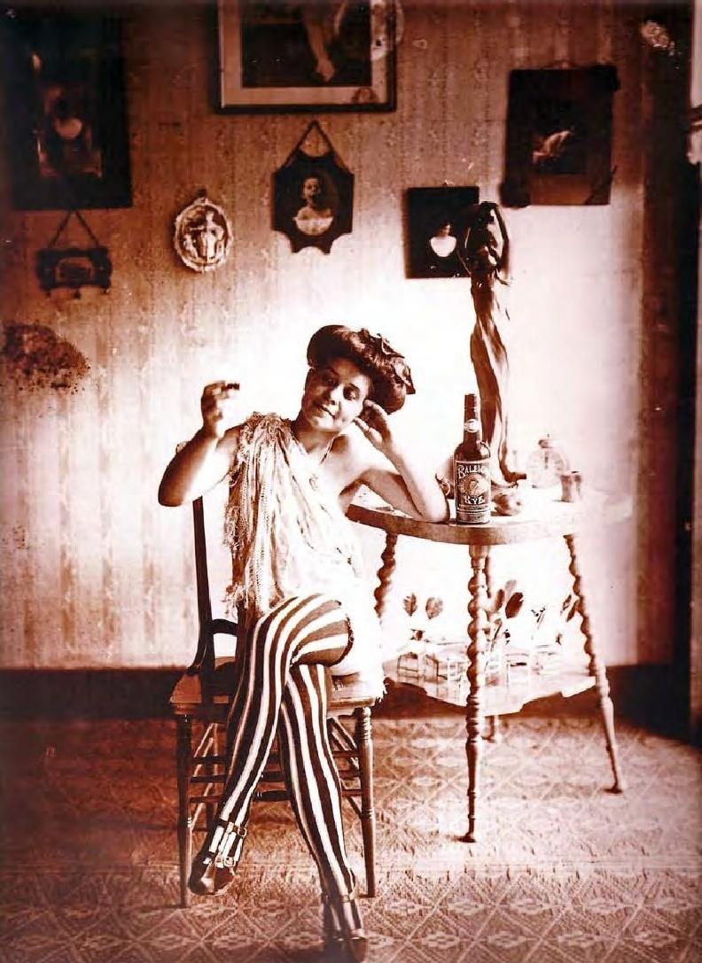 Bellocq, E. J. Photograph of Woman in Striped Leggings. 1915.