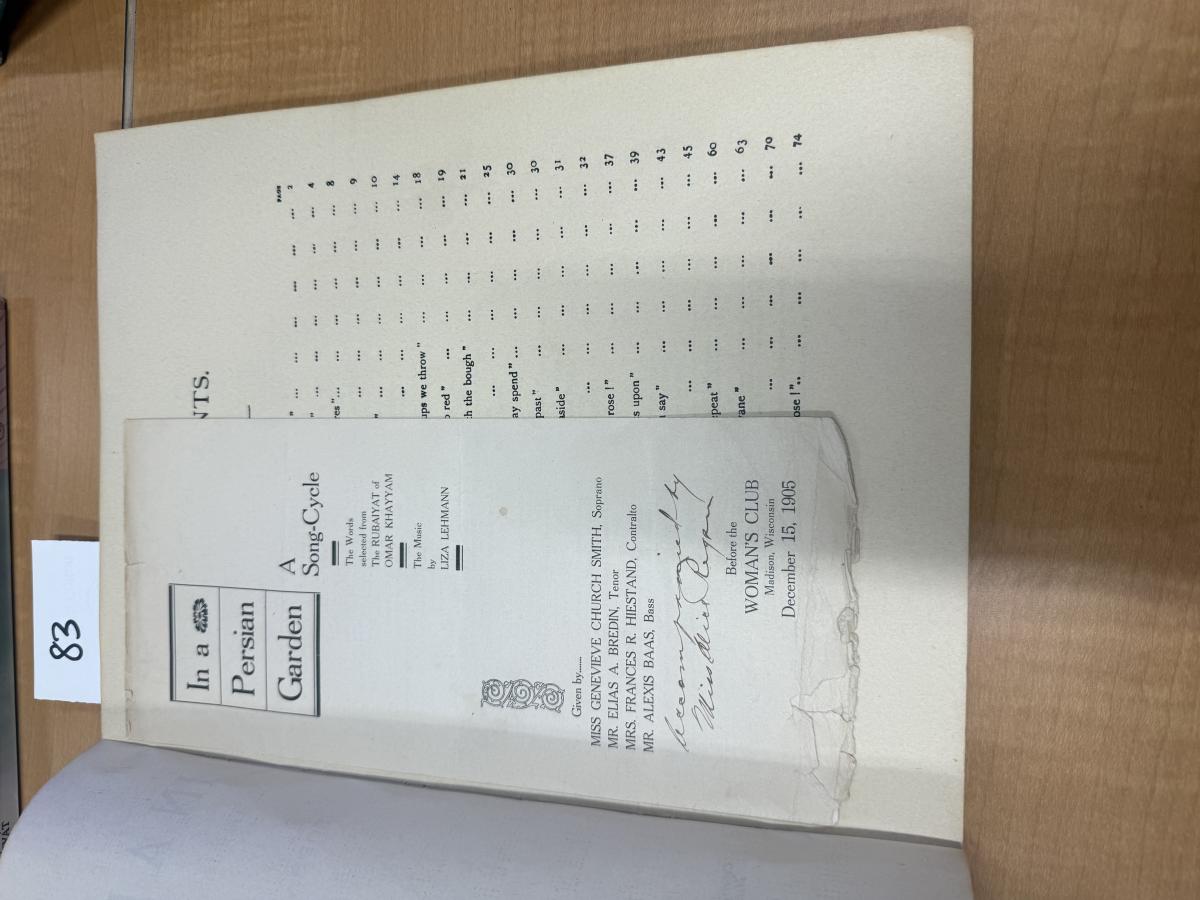 The cover of the edition includes the decorative design of pillars and arches with flowers, along with the title and information on the piece, Page of the musical score which includes a footnote from Fitzgerald's translation, Cover of the program