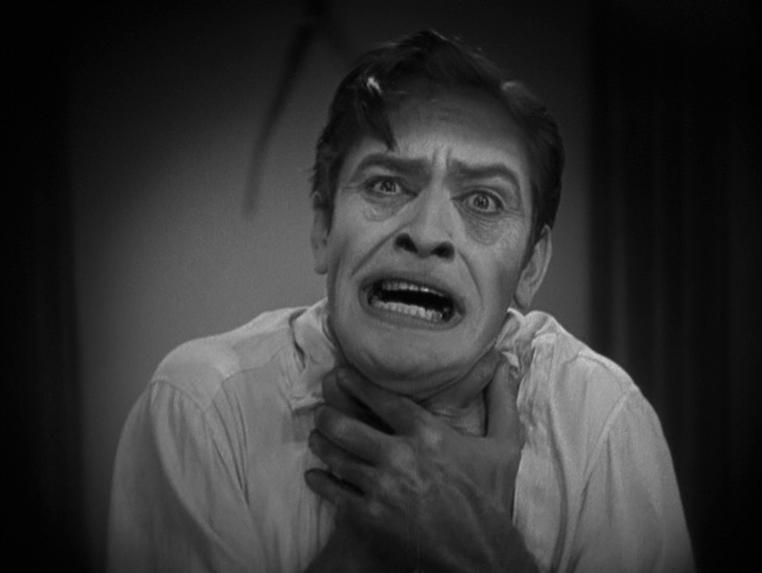 Dr. Jekyll grasping at his throat as he transforms into Mr. Hyde. 