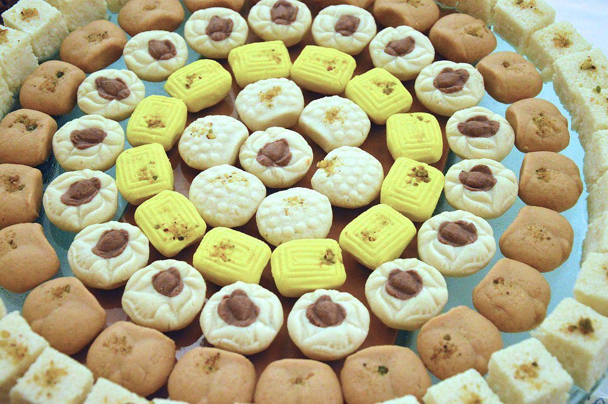 Several types of sandesh arranged on a circular platter