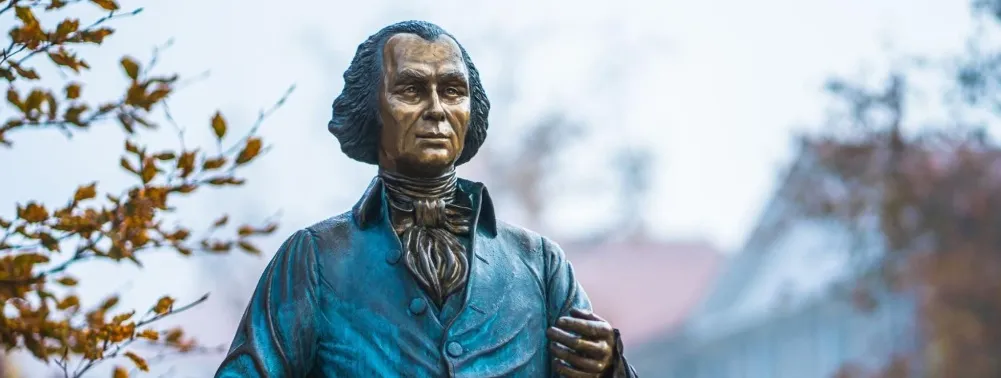 A statue of Madison at James Madison University